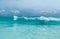 Turquoise water and big waves in Seychelles - La Digue beach. Travel and vacation wallpaper