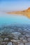 Turquoise water of Dead Sea. Jordan sunset landscape