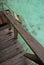 Turquoise Water Direct Access to Crystal Clear Water from your private overwater bungalow at a tropical resort island, Maldives