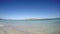 Turquoise water in La Pelosa beach seen from the foreshore. Sardinia