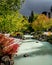 The turquoise water of the Pond in Village Park on the Village Stroll at the Olympic Plaza in the Village of Whistler