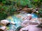 Turquoise waterfall in France