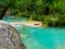 Turquoise waterfall in France