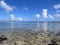 Turquoise waters of the Caribbean Sea with a line of buoys to control the access of seaweed. Algae control system in tropical