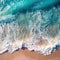 The turquoise wave of the ocean rolls on the sandy shore. Amazing seascape. Generative AI