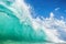 Turquoise waves against the sky