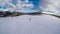 Turrach - A girl going down a snowy slope on a snowboard