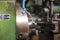 Turret lathe in operation for metal processing