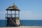 Turret with reed roof installed on the beach in Vama Veche. photo during the day.