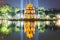 Turtle tower at night in Hoan Kiem lake in Hanoi, Vietnam