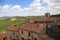 Tuscan hills and roofs of old houses in the Italian village, Tuscany, Italy