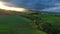 Tuscany aerial sunrise farmland hills, Italy