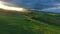 Tuscany aerial sunrise farmland hills, Italy