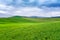 Tuscany landscape with green rolling hills