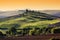 Tuscany landscape at sunrise. Tuscan farm house, green hills.