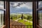 Tuscany rural landscape as seen out of the window of the farmhouse. Agro-tourism in Italy.