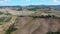 Tuscany rural landscape with house, cypress road and hills. Agritourism, Italy.