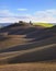 Tuscany, rural landscape. Rolling hills and farm.