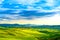 Tuscany, rural sunset landscape. Countryside farm, white road an