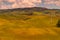 Tuscany, summer landscape of the city of Volterra with hills and field