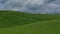 Tuscany video time lapse footage with clouds and green fields