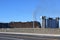 TUSTIN, CALIFORNIA - 13 NOV 2023: The Tustin MCAS Blimp Hangar Fire, still smoldering as the North wall slowly burns away