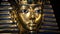 Tutankhamun Golden Mask With Dust Particles Floating