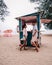 Tutu beach Pattaya Thailand, couple relax on the beach, men and woman on retro beach setting in Jomtien