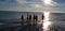 Tutus on the beach as the sun rises