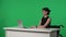 TV Live News Program: Female Presenter Reporting. Asian Anchorwoman in a wheelchair Talks, Listens, Nods against the
