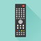 TV remote control with long shadow on turquoise background. On the buttons the text: `What do you want to watch?` Concept of strea