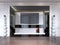 TV stand in Suite living room with TV in large glossy black frame with large candlesticks near, modern apartment