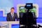 Tv studio camera recording reporter or anchorman. Live broadcasting