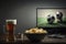 TV, television watching football match with snacks and alcohol. relax in front of the TV. A fan match play off. a plate