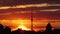 TV tower in the silhouette of the sunset, beautiful orange fiery sky