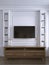 TV on wall with cabinet in classic living room, many bookshelves on back white wall background