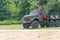 Tver region, Russia. The car. The car. A ZIL truck with a crane. A Zil logging truck with a cargo lifting arm and a trailer