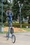 Tweed ride 2017. Unknown man rides a strange, very high bike.
