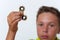 Tween boy holding fidget spinner, closeup