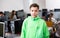 Tween schoolboy standing in computer class ready for lesson