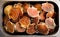 Twenty scallop shells with scallops grouped together