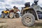 Twi quadricycles or quad bikes on the mountains background on a cloudy day