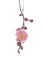 Twig of blooming plum tree with pink flowers