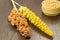 Twigs sorghum and yellow millet. Wheat in a wooden basket