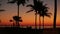 Twilight Beach Silhouettes On Orange Sky, Asia