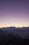 Twilight on Cattle Back Mountain with moon in the sky