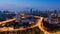 Twilight city highway aerial view with city downtown background, Bangkok Thailand