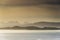 Twilight landscape over the beach in the Lealt waterfall cliffs south of Staffin, Isle of Skye