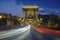 Twilight shot of traffic crossing the Chain Bridge