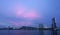 Twilight sky over Siracha cityscape